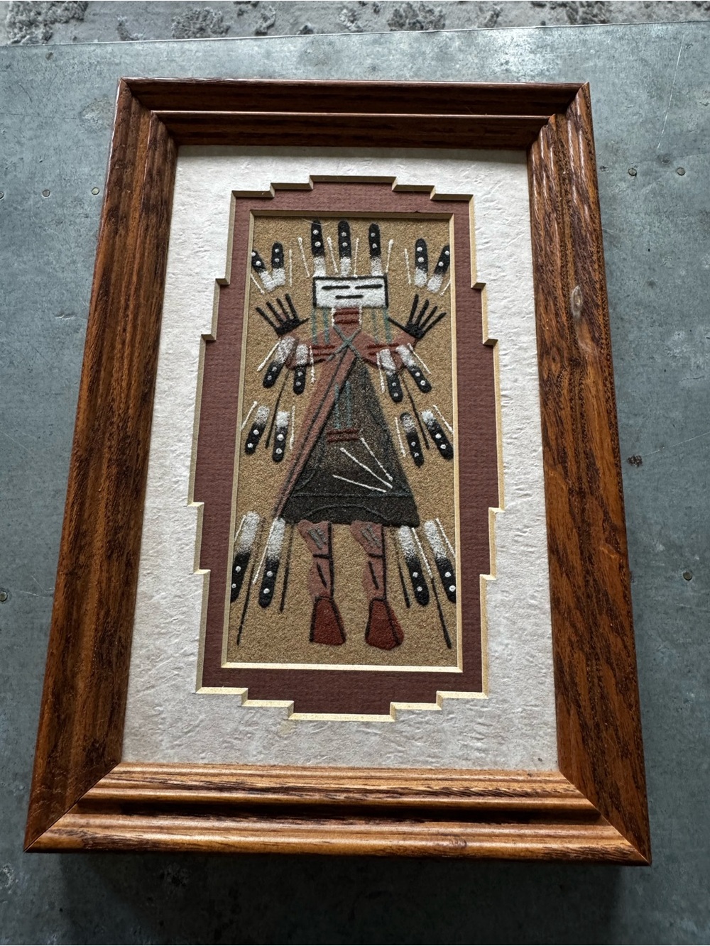 Framed 9” x 6” Navajo Sand Painting By Marlene Doby. COA on back.